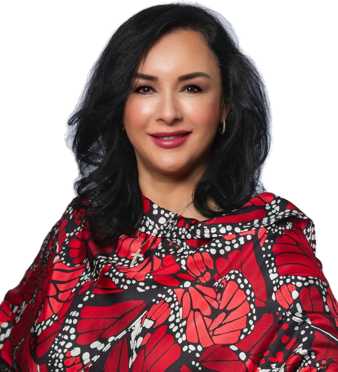 Blanca Criner, CPEC, founder of Pronto ONE consulting, wearing a red print top